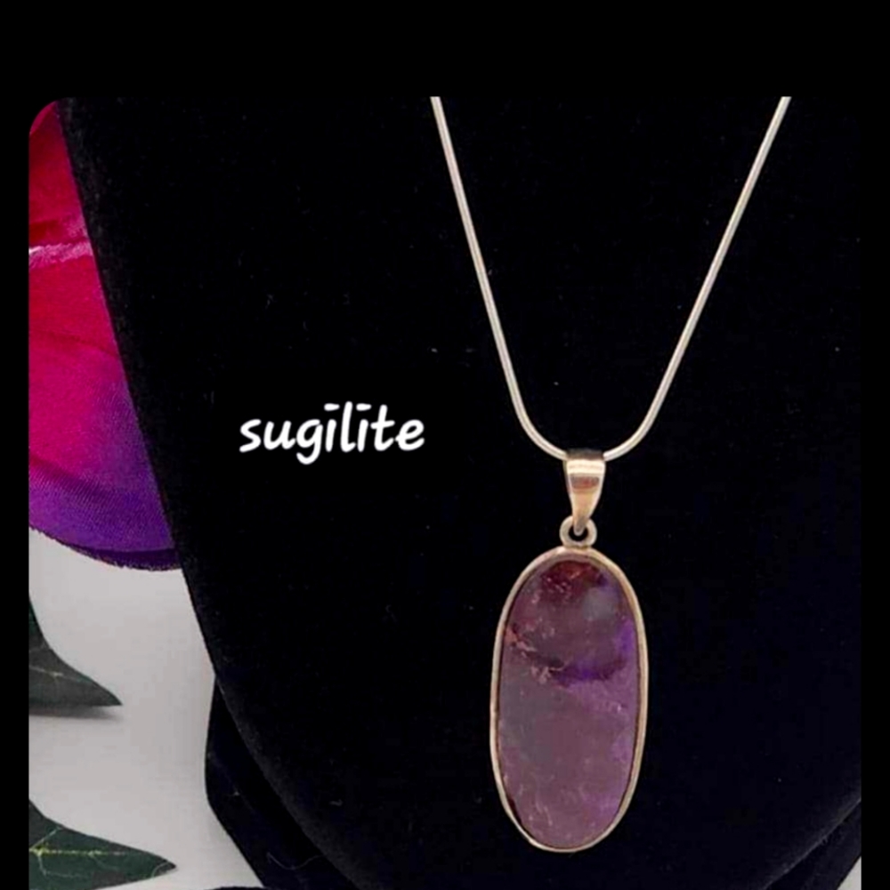 Sugilite charm on sterling silver